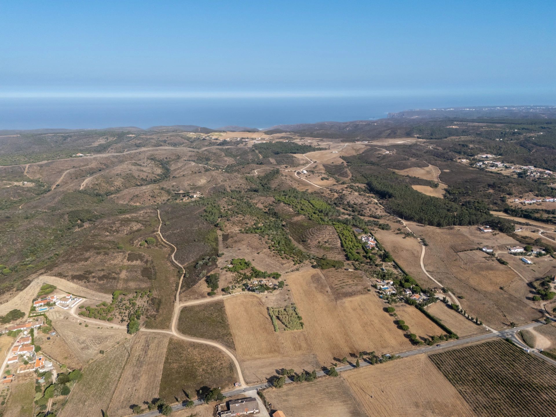Drone view over the estate toward the Atlantic